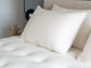 two organic pillows on our Deluxe Organic Mattress Topper